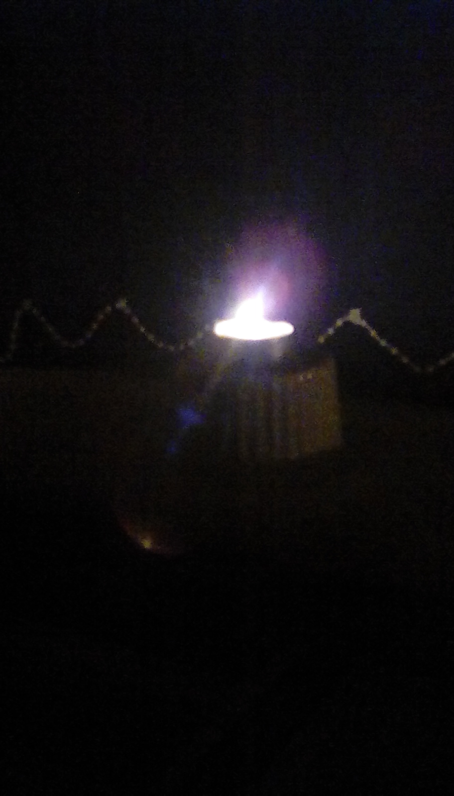 Candle on a ramekin
